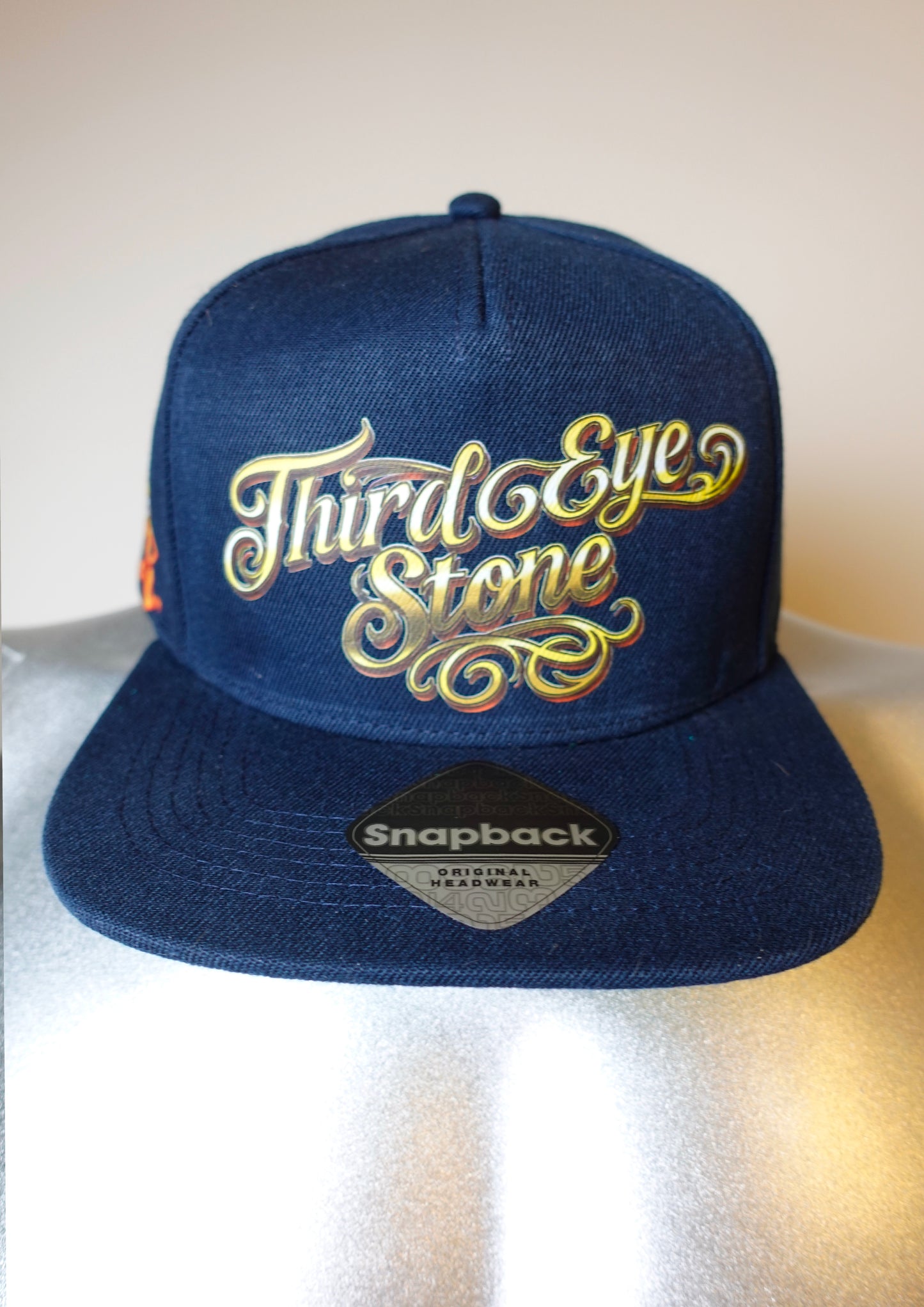 Casquette à visière plate bleue marine